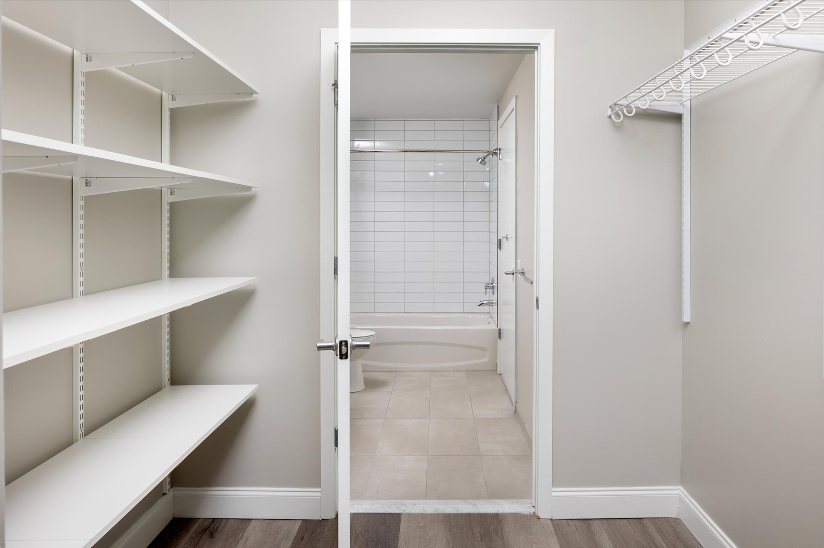 Walk-in closet and bathroom